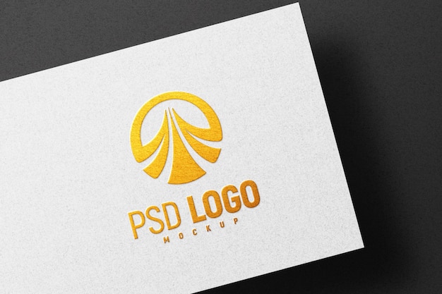PSD | Golden logo mockup embossed on white paper