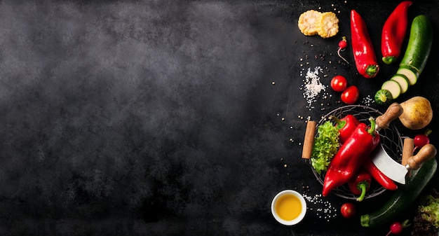Photo | Vegetables set to the left of a black slate